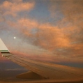 Moonrise/sunset while flying to California